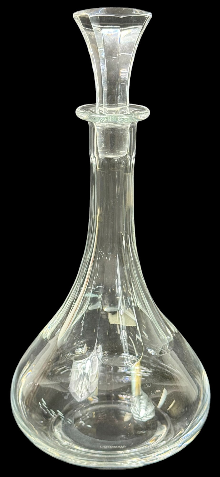 Christofle French Clear Crystal Liquor Decanter: Christofle French clear art glass decanter and stopper featuring a sculptural, freeform design. The piece showcases smooth, fluid contours and excellent clarity. Signed 'Christofle' underneath its bas