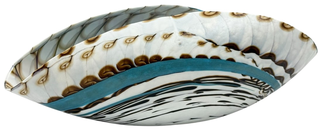 Iridescent Shell Motif Aqua Swirl Centerpiece Bowl: Contemporary decorative centerpiece bowl, featuring a mesmerizing combination of aqua blue, caramel brown, and white swirl patterns with an iridescent, lustered sheen finish designed in a seashell-lik