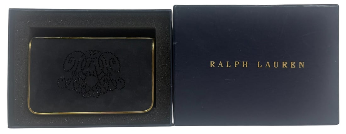 Ralph Lauren Brass Hinged Trinket Box w Retail Box: Ralph Lauren trinket box featuring a black lid with an embossed monogram design and brass-toned metal body. The box opens to a sleek black interior, ideal for small jewelry or desk accessories. Stamp