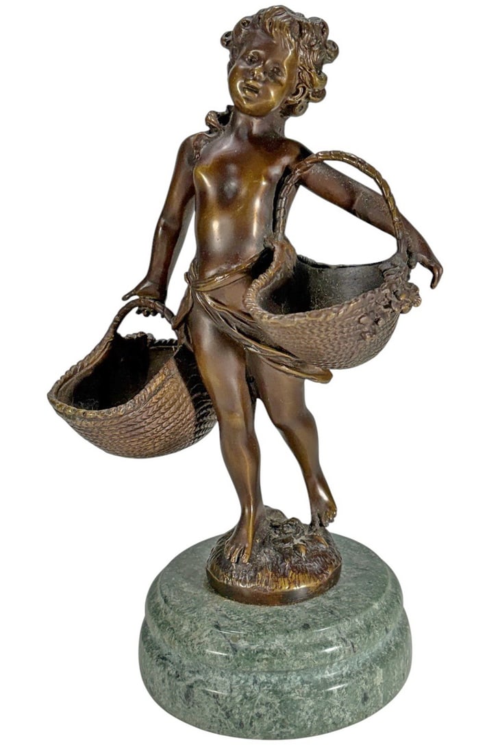 After Suzanne Bizard Girl Bronze Sculpture: Bronze sculpture of a figure carrying baskets, after Suzanne Bizard (French, 1873 - 1963), with warm brown patina and fine detail, mounted on green marble base.Dimensions: 11 X 6.25 X 4.5 in. Conditio