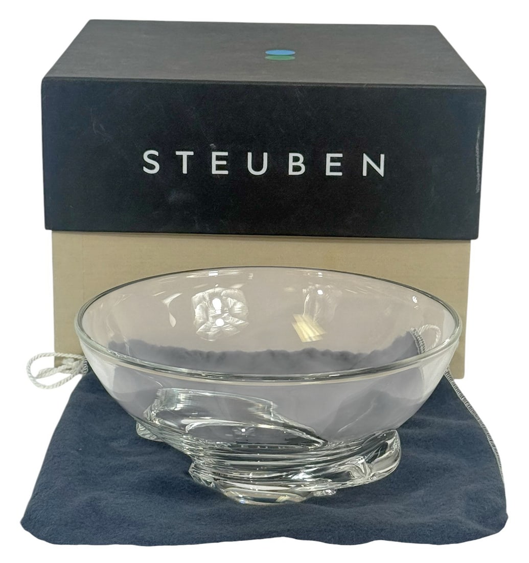 Steuben Clear Crystal Bowl w/ Dust Cover & Box: Steuben lead crystal 'Spiral Bowl' designed by Donald Pollard. Etched signature 'Steuben' is present on the base. Comes with its original dust cover, insert card and box. The bowl measures approximate