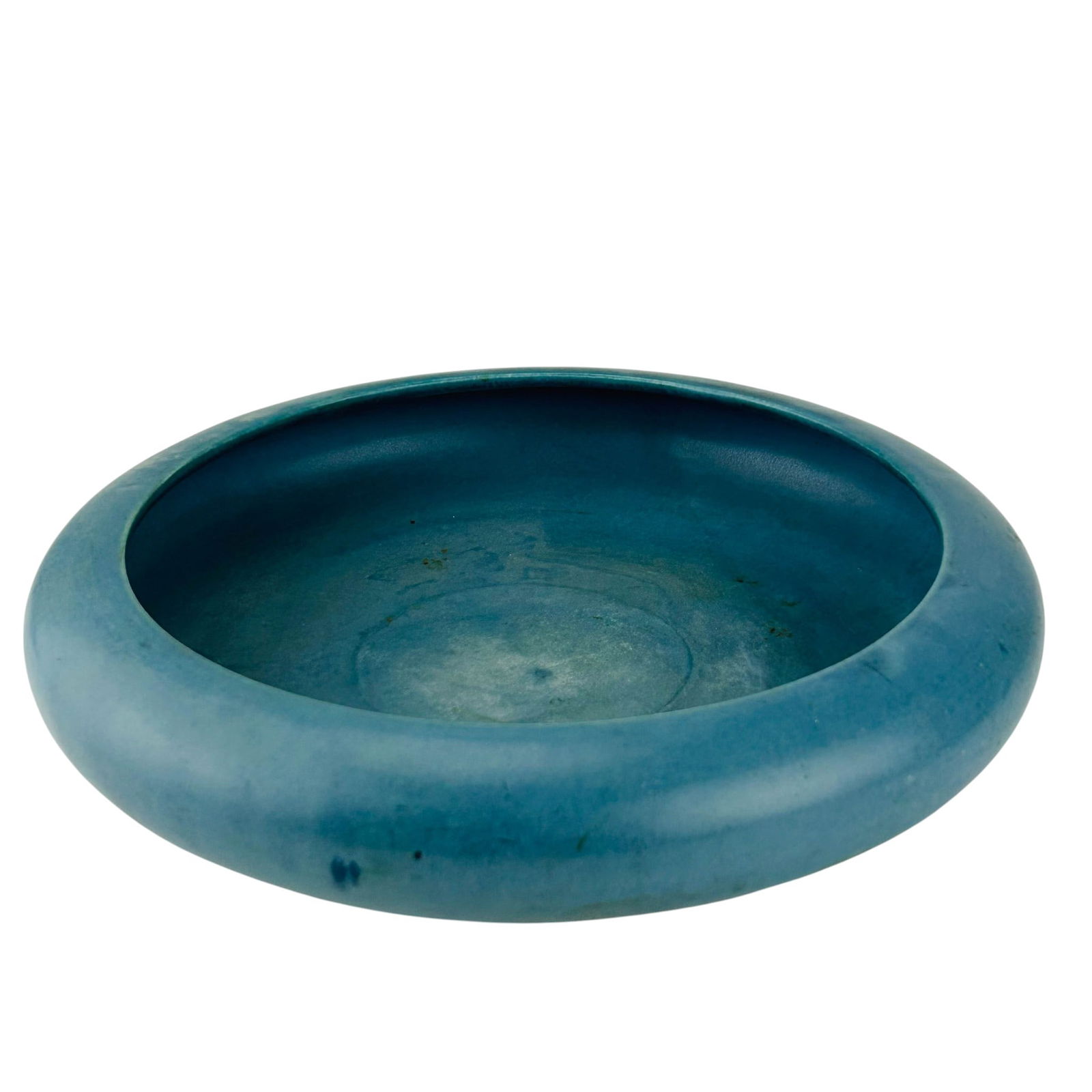 Rookwood Arts & Crafts Art Pottery Console Bowl: Rookwood, American decorative ceramic piece dated 1920, model number 2106B, showcasing a wide shallow profile with gently spreading edge. Coated in a smooth subdued finish with delicate color variatio