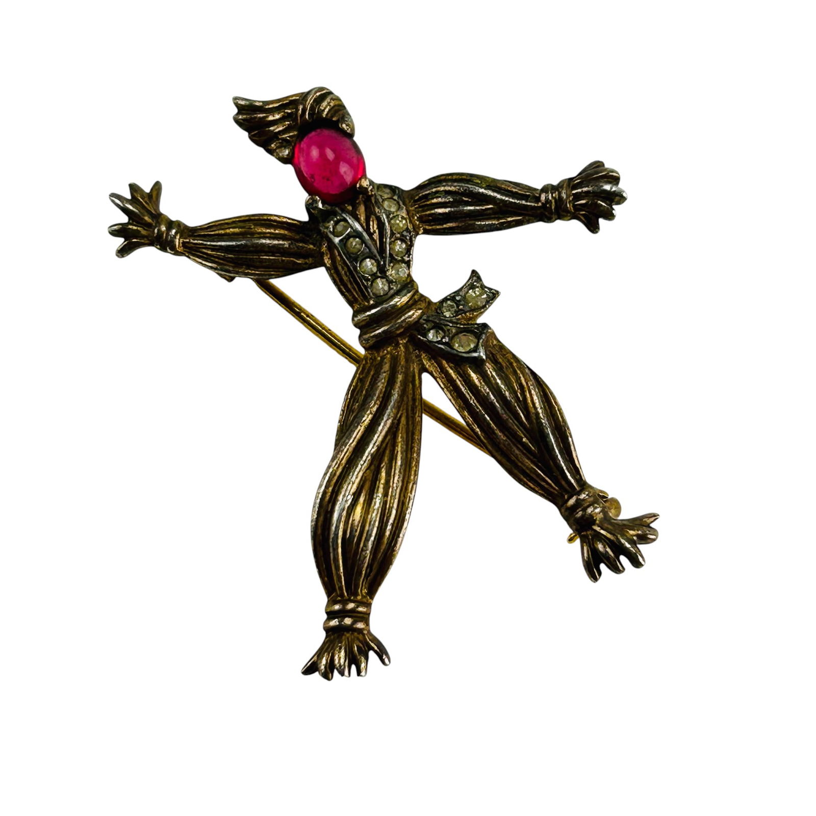 Alfred Philippe Trifari Sterling Rintintin Brooch: Alfred Philippe for Crown Trifari sterling silver 925 Rintintin straw ragdoll brooch, circa 1940s. Figural design depicting a whimsical figure with a red cabochon glass head, and pave rhinestone embel