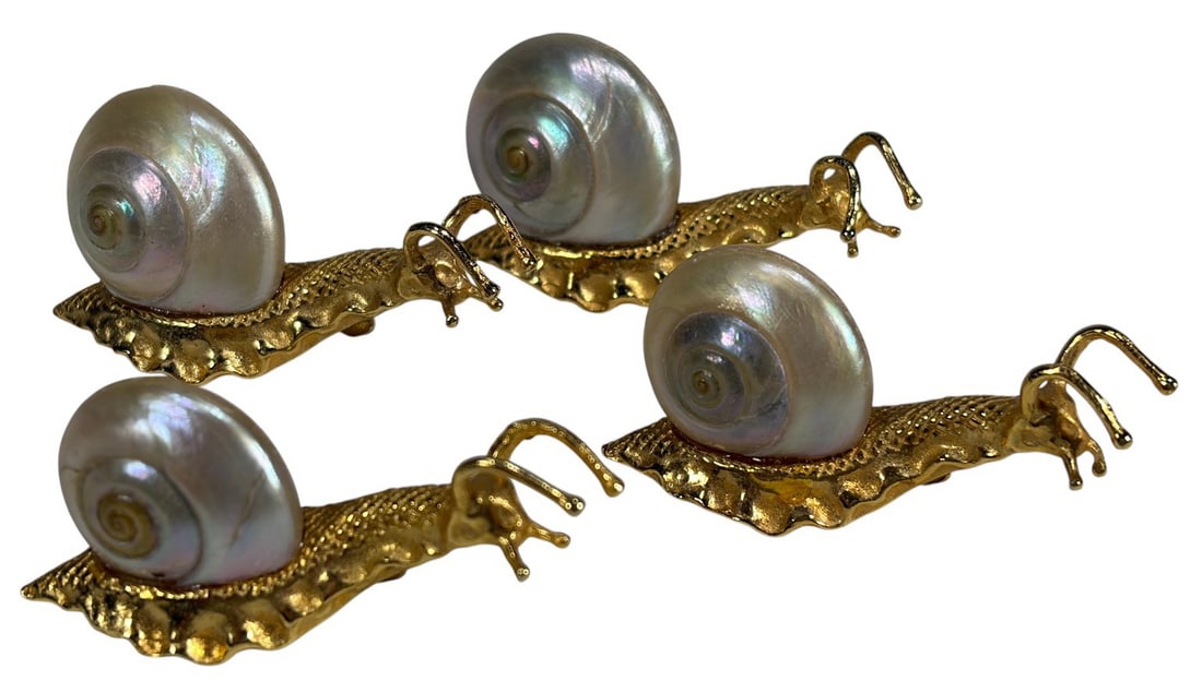 Tiffany Style Gilt Metal & MOP Snails 4pc LOT: Four Tiffany-style snails with iridescent mother-of-pearl shells on textured gilt metal bodies, finely modeled in Art Nouveau style. Each piece measures approximately 1 inch tall by 2 inches wide by 0