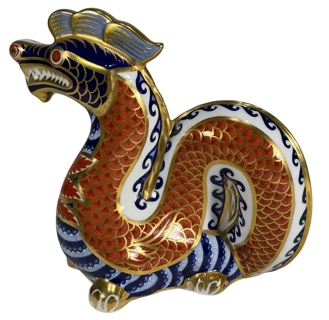 Royal Crown Derby Dragon Imari Porcelain Fig: Royal Crown Derby bone china dragon in Imari palette of cobalt blue, iron red, and gilt accents, finely hand-painted with intricate detail. Underside is stamped with red Royal Crown Derby mark.Dimensi