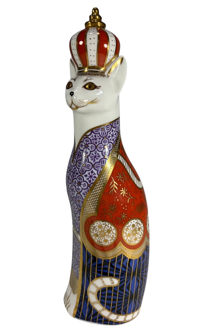Royal Crown Derby Abysinian Royal Cat Figurine: Royal Crown Derby 'Abyssinian' cat, 1986 Royal Cats Collection, hand-painted in Imari colors of blue, red, and lavender with gilt geometric and floral designs. Underside is stamped with red Royal Crow