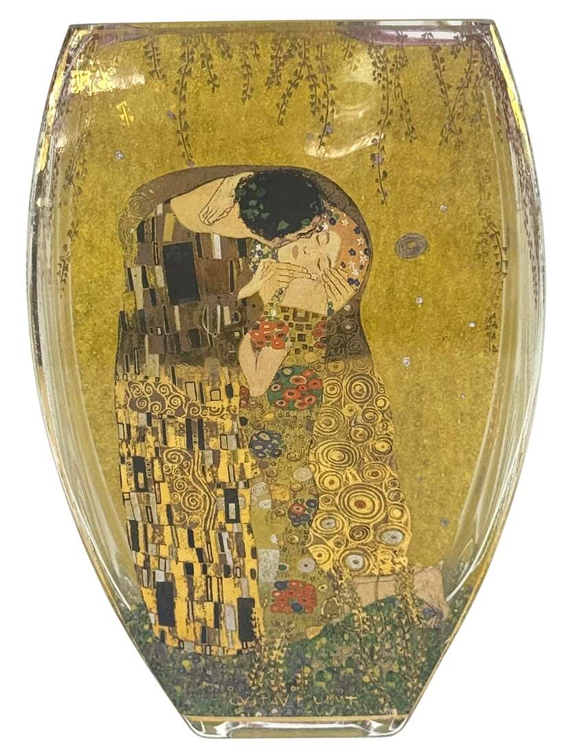 Goebel Gustav Klimt Artis Orbis Art Glass Vase: Goebel Artis Orbis art glass vase featuring Gustav Klimts 'Der Kuss' (The Kiss) design. The artwork is applied to the interior back, creating a layered visual effect through the clear curved glass. Ma