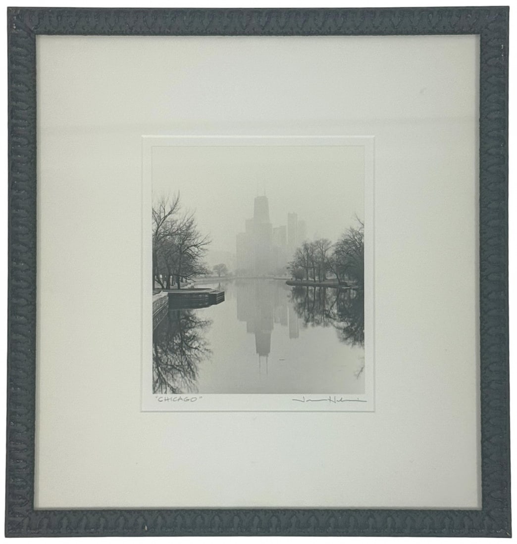 Chicago Skyline Ansel Adams Style Photograph: Monochrome photograph featuring the Chicago city skyline reflected in a calm river with bare winter trees. Reminiscent of the style of Ansel Adams. Though the signature is illegible, this piece is han