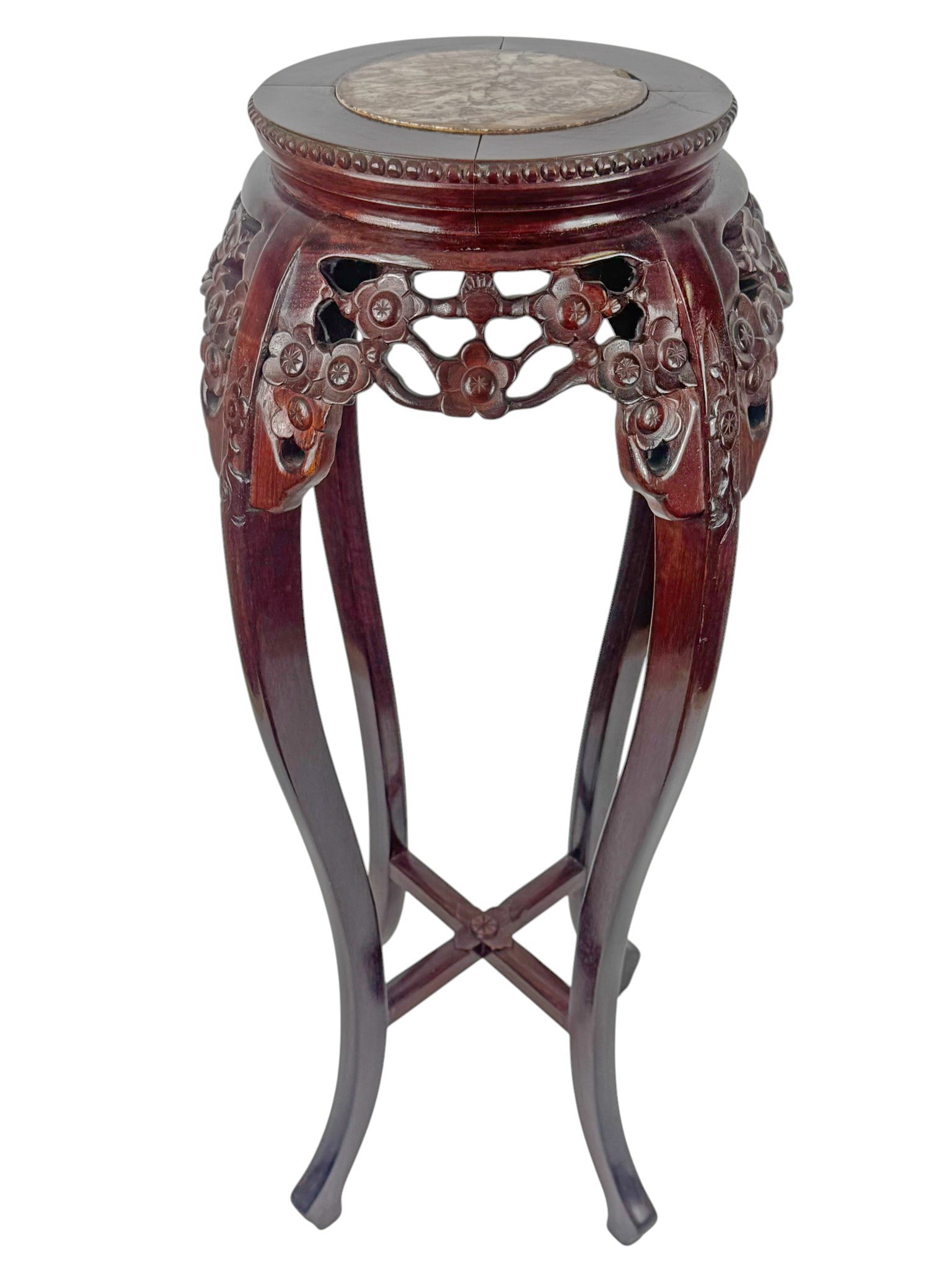 Chinese Carved Rosewood Marble Top Pedestal Stand: Chinese hardwood pedestal plant stand, featuring a hand-carved floral apron and an inset marble top. The piece is crafted from richly toned rosewood or hongmu, with graceful cabriole legs joined by a 
