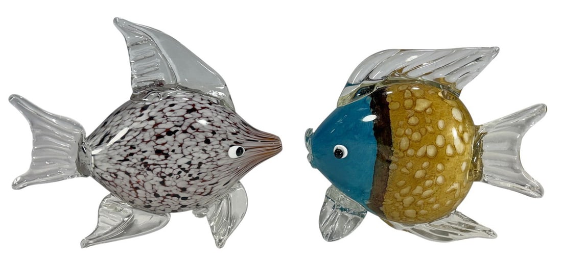 Italian Murano Glass Fish Figurines 2pc LOT: Pair of Italian Murano glass fish with clear fins and multicolor bodies, hand-blown with applied details and expressive eyes. The largest measures approximately 8 inches tall by 9 inches wide by 3 inc