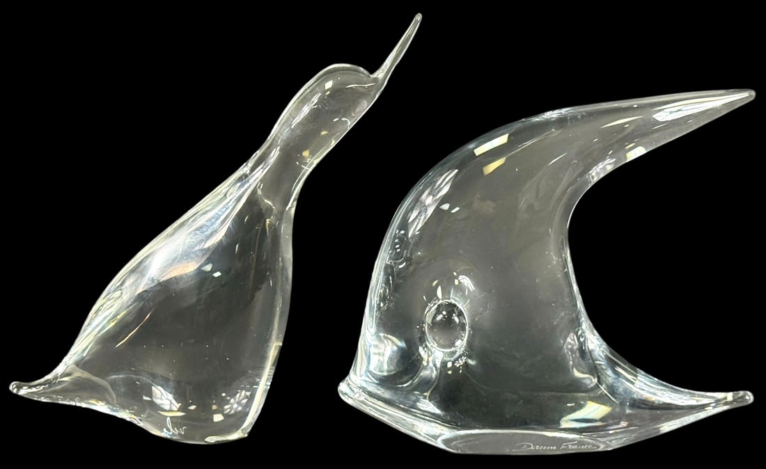 Daum French & Vilca Italian Art Glass Figures 2pcs: Lot of two clear crystal art glass animal figurines including a stylized angel fish signed 'Daum France'. The other of a penguin or duck signed 'Vilca'. The Daum piece measures approximately 8 inches