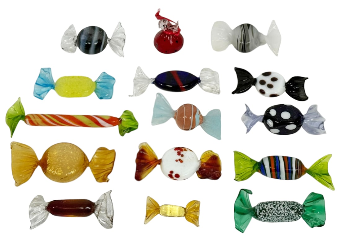 Collection of Murano Art Glass Candies 15pc LOT: Lot of fifteen Italian Murano-style art glass candy decor in a variety of vibrant colors, patterns, and forms. Each piece is individually hand-blown to resemble wrapped sweets, featuring detailed twis