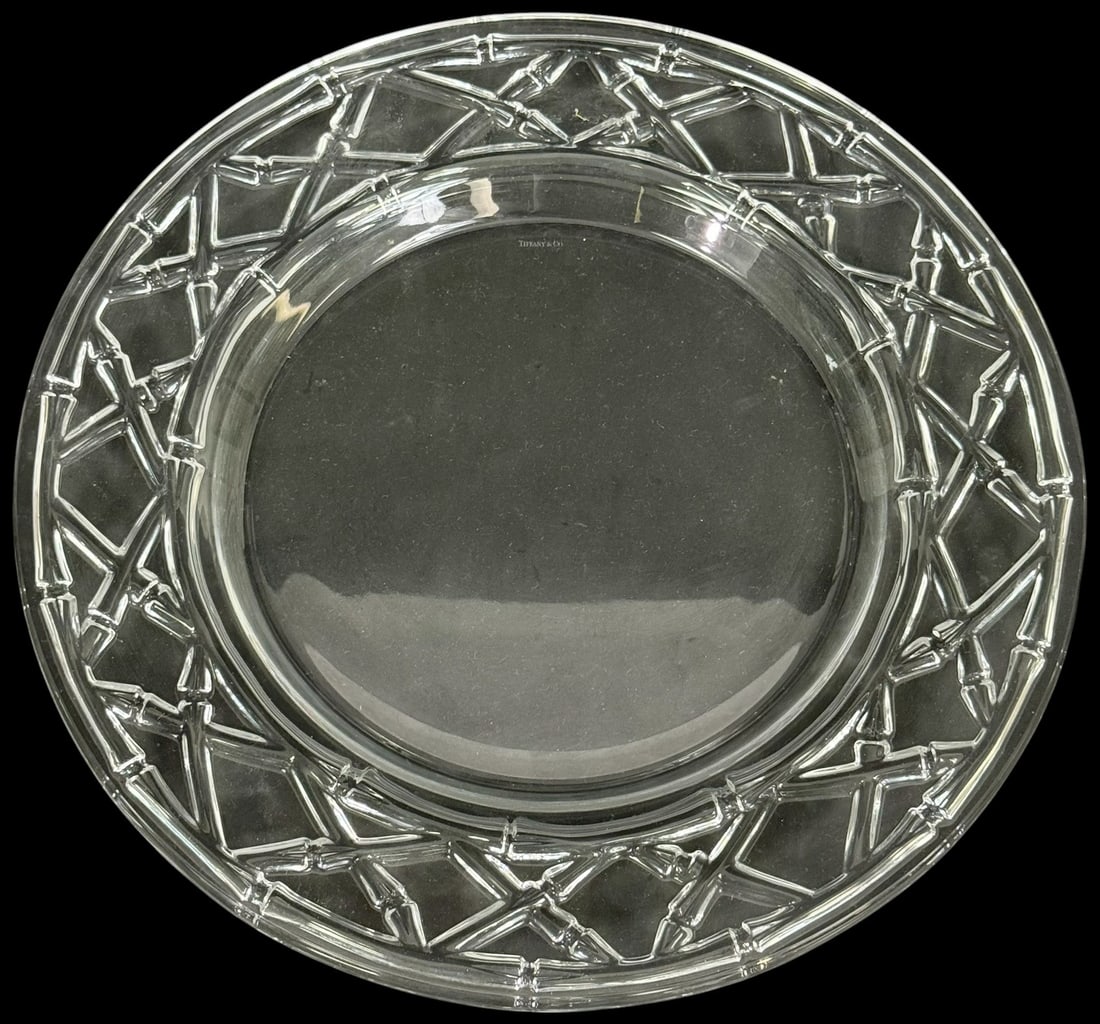 Tiffany & Co. Clear Crystal Atlas Center Bowl: Tiffany & Co. clear lead crystal American center bowl, in the 'Atlas' pattern. Distinguished by its sculptural Roman numeral-inspired motif encircling the wide rim. The base bears its 'Tiffany & Co.'