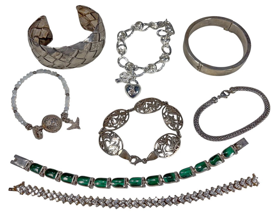 Sterling .925 Malachite Glass Bracelets 8pc LOT: Lot of eight sterling silver bracelets, including malachite links, a woven cuff, filigree and mesh styles, a hinged bangle, a moonstone glass stretch bracelet, and a charm bracelet. Some pieces are st