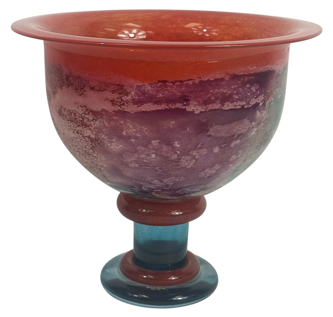 Kosta Boda Art Glass Goblet Bowl by Kjell Engman: Kjell Engman for Kosta Boda, hand-blown art glass goblet style center bowl. This large vessel features a vibrant and dynamic palette with layered hues of deep red, violet, blue, and mossy green, accen