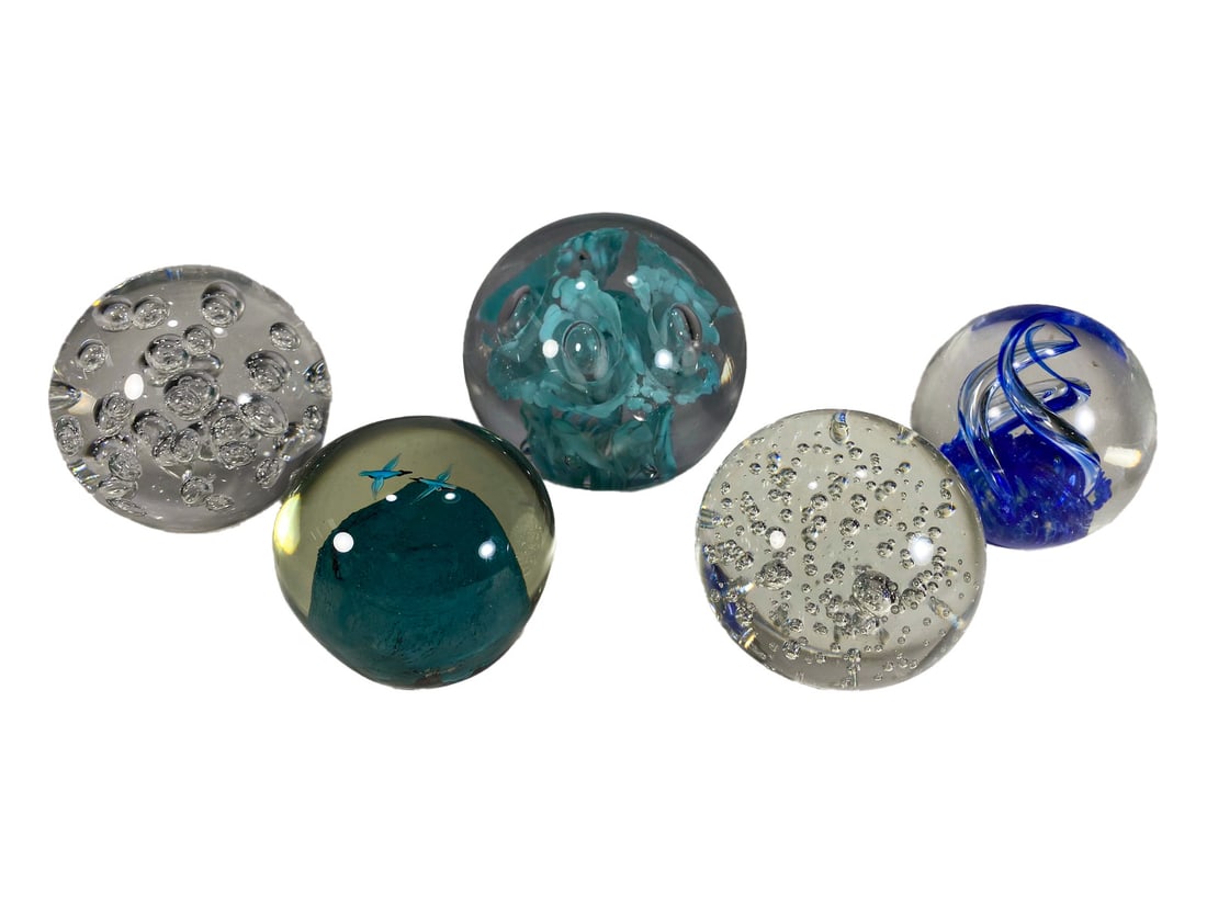 Italian Murano Glass Paperweights 5pc LOT: Italian Murano group of five hand-blown glass paperweights with varied designs, including floral inclusions, ribbon twists, controlled bubbles, a teal mound with applied birds, and an orb encased in d