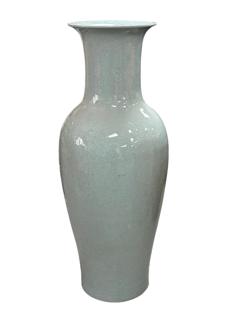 Chinese Large Celadon Crackle Ceramic Vase 41" H: Chinese large celadon crackle glazed ceramic vase of tall baluster form with narrow neck and flared rim, with pale celadon glaze and dense crackle throughout.Dimensions: 41.25 X 14 X 14 in. Condition:
