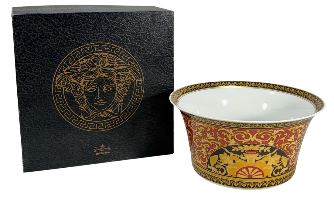 Rosenthal Versace Medusa Studio Line Bowl: Rosenthal meets Versace Medusa porcelain bowl. Studio Linie. Red, gold, and black neoclassical scrollwork with figures in ornate cartouches. Ikarus form, Paul Wunderlich. Germany. Wide flared bowl for