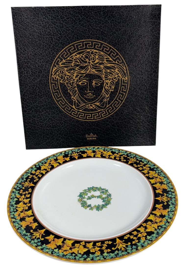 Rosenthal Versace Gold Ivy Studio Line Plate 10.5": Rosenthal Studio Linie for Versace Gold Ivy porcelain plate. Ikarus collection. Central ivy wreath. Wide black rim with gold ivy leaves, teal foliage, and gold flourishes. Gold trim. Marked Rosenthal