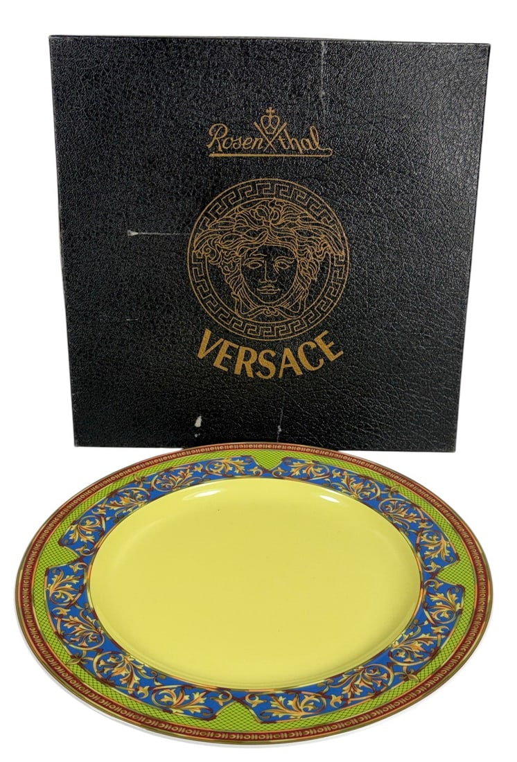 Rosenthal Versace Russian Dream Porcelain Plate: Rosenthal for Versace 'Russian Dream' plate from the Studio Linie Ikarus collection. Featuring a lemon-yellow center with a richly colored band of gold, cobalt blue, red, and green scrolling foliage.
