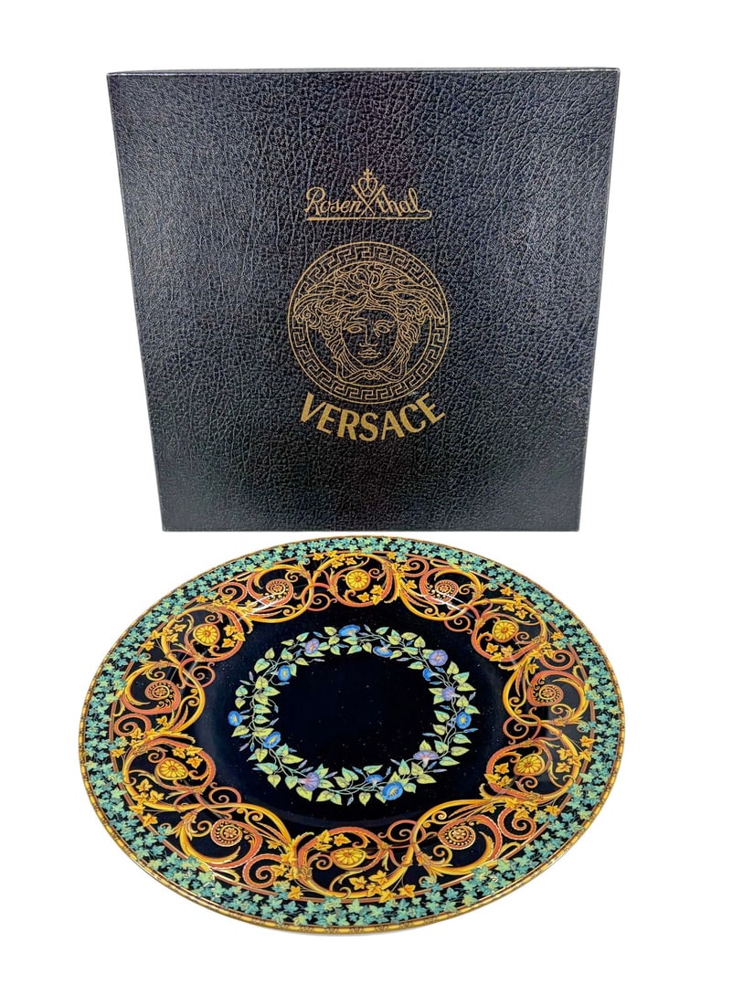 Rosenthal Versace Gold Ivy Studio Linie Plate: Rosenthal for Versace 'Gold Ivy' studio-line service plate, made in Germany. This porcelain plate features an opulent baroque ivy and scroll motif in gold, green, and blue on a bold black ground, with