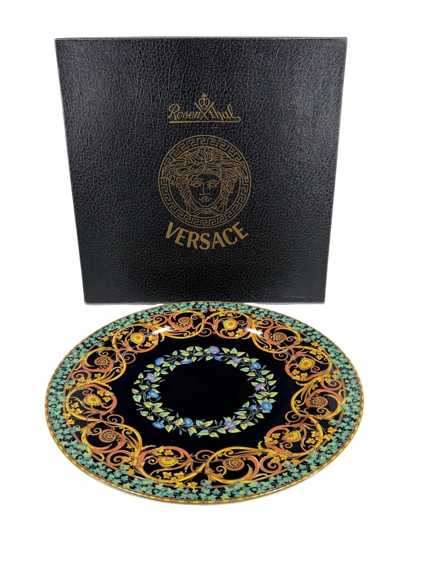 Rosenthal Versace Gold Ivy Studio Linie Plate: Rosenthal for Versace 'Gold Ivy' studio-line service plate, produced in Germany. This porcelain charger features a black ground with an intricate baroque scroll and floral design in gold, orange, blue