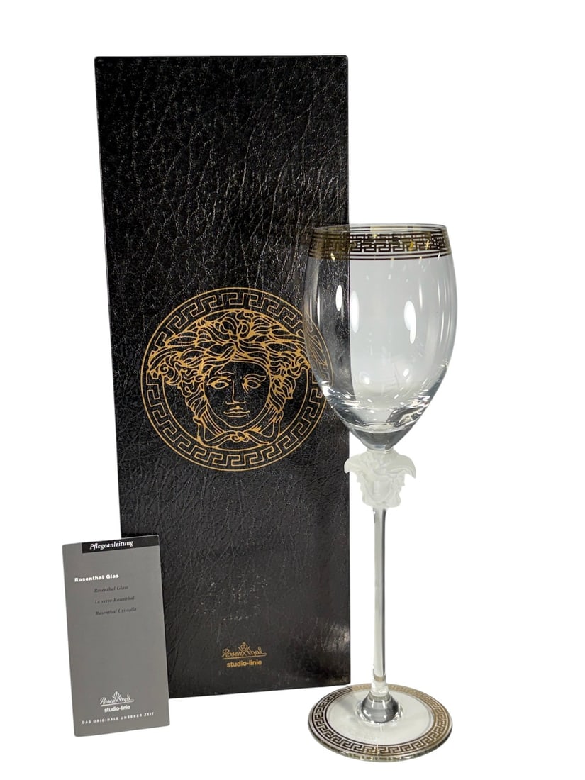 Rosenthal Versace Medusa D'Or White Wine Glass: Rosenthal for Versace Medusa dOr white wine glass. Studio Linie lead crystal. Frosted Medusa head stem. Gilt Greek key trim at rim and base. Etched underside reads Rosenthal studio-linie Germany