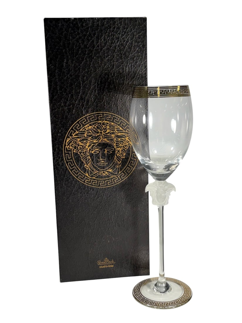 Rosenthal Versace Medusa D'Or White Wine Glass: Rosenthal for Versace Medusa dOr white wine glass with an elegant silhouette, frosted Medusa head stem, and Greek key trim circling the rim and base. Etched underside reads Rosenthal studio-linie