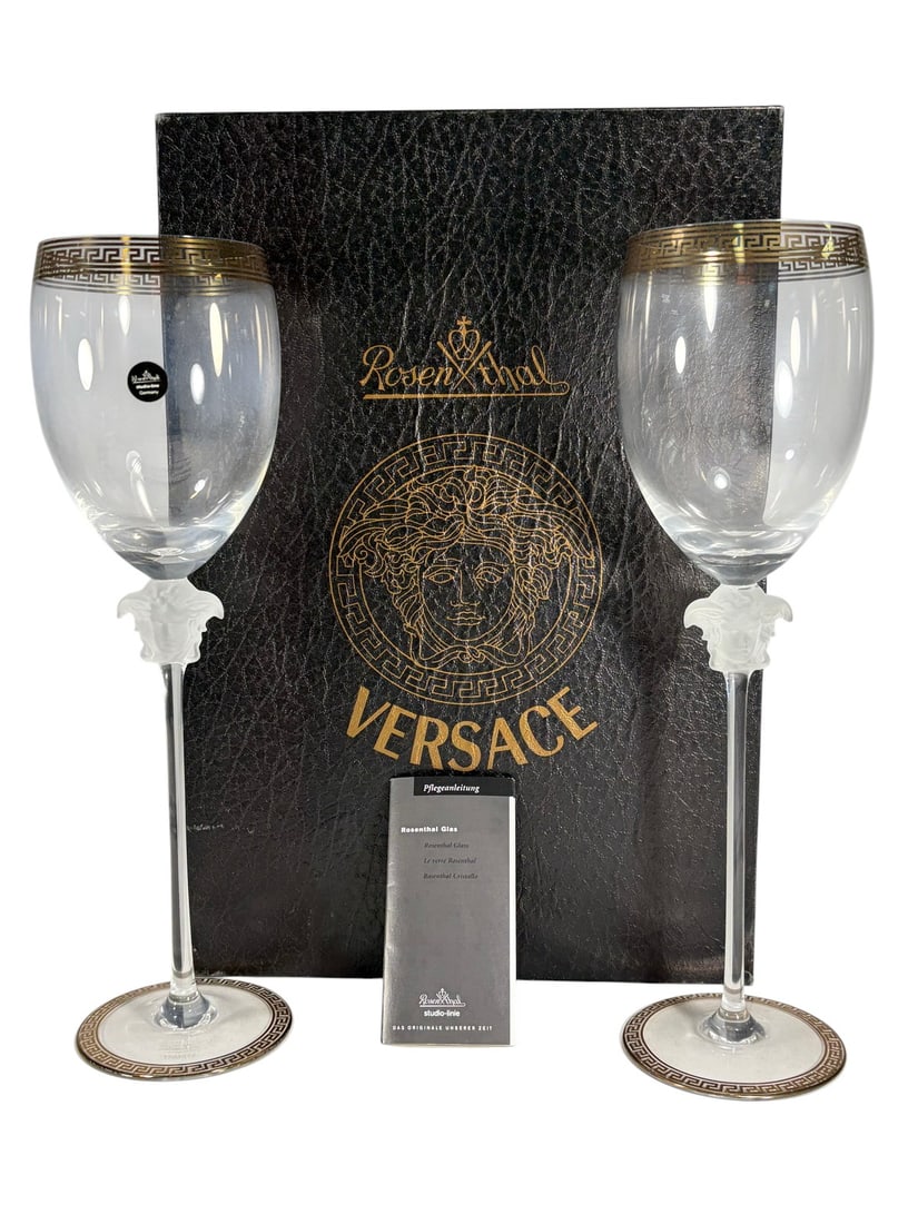 Rosenthal Versace Medusa D'Or Water Glasses 2pcs: Pair of Rosenthal for Versace Medusa d'Or water goblets. Rosenthal Studio Linie. Frosted Medusa head stems with gilt Greek key trim at rim and foot. Etched base reads Rosenthal studio-linie Germany