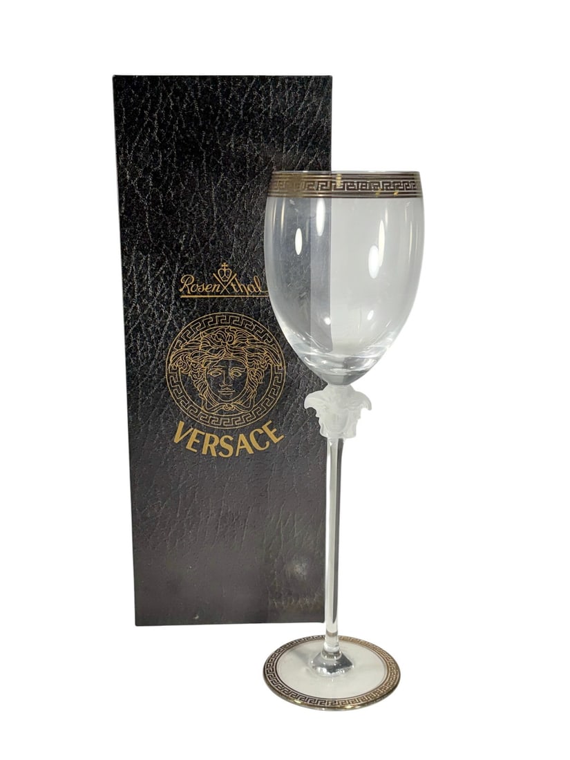 Rosenthal Versace Medusa D'Or Water Goblet: Single Rosenthal for Versace Medusa d?Or lead crystal water goblet, with frosted Medusa head stem and gilt Greek key trim at rim and foot. Rosenthal Studio Linie. Etched base reads Rosenthal