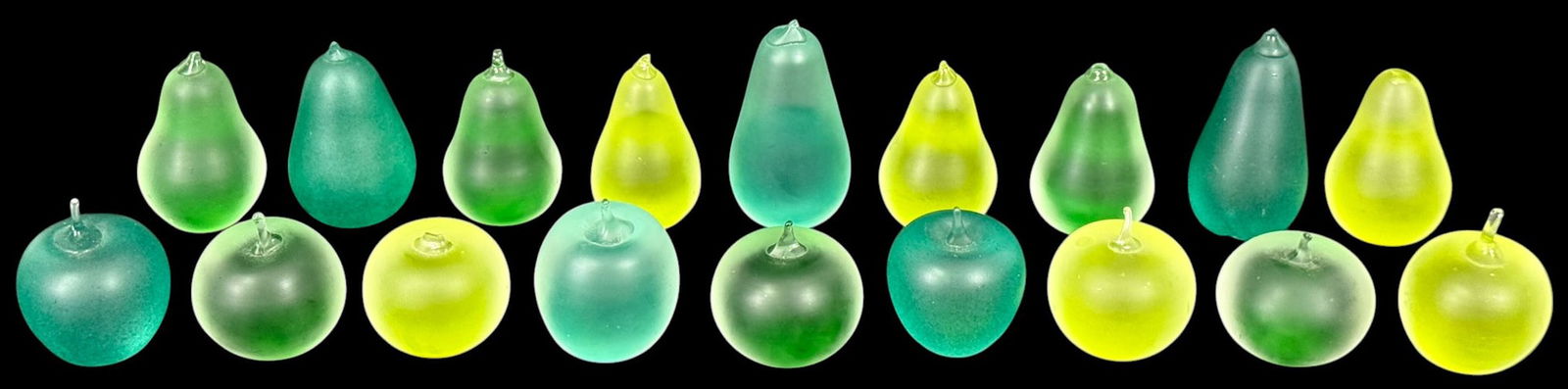 1988 Studio Art Glass Fruit Paperweight 18pc SET: Lot of eighteen, artist signed studio art glass fruit sculptures/paperweights. The collection features an assortment of pears and apples in translucent, frosted glass with hues ranging from acid green