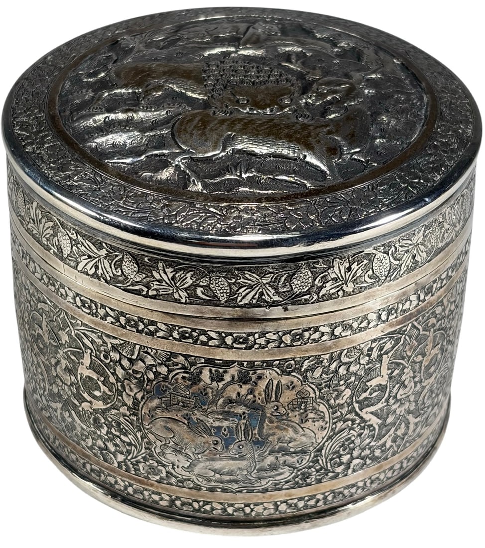 Vintage Persian 875 or 900 Silver Round Box: Persian vintage round silver box with hand-chased zoomorphic and floral decoration, featuring animals and hunting scenes throughout. Stamped with Persian silver hallmarks, likely indicating .875 or .9