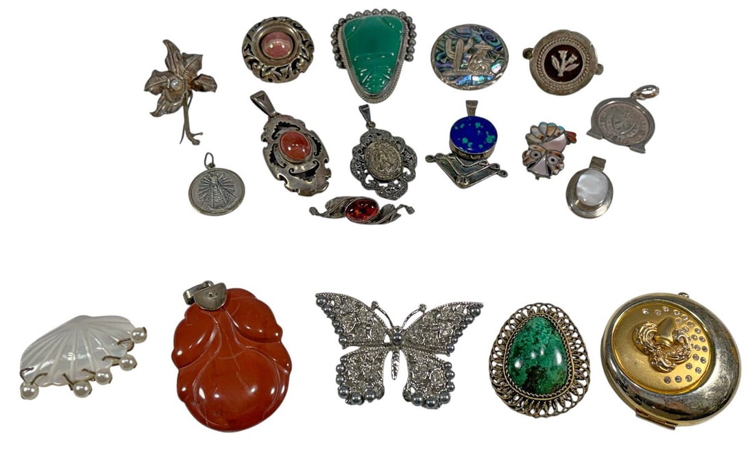 13 Sterling 925 Pendants & 5 Others 18pc LOT: Grouping of eighteen pendants, including thirteen sterling silver pendants and five non-silver examples, in assorted designs with stone, inlay, medallions, and figural motifs. The largest measures