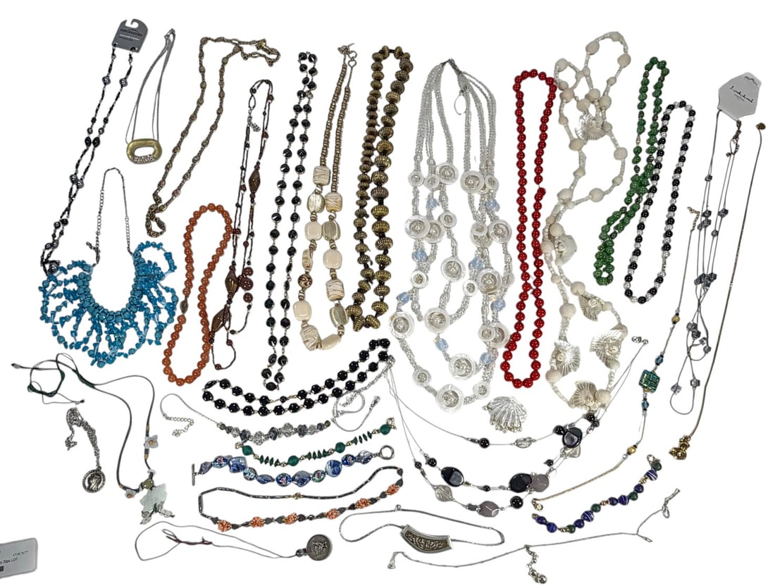 Necklaces & Bracelets: Costume Jewelry 30pc LOT: Vibrant 30-piece costume jewelry lot of mostly necklaces and bracelets in mixed materials and assorted styles. The largest measures approximately 17 inches tall by 3.5 inches wide.Condition: Good