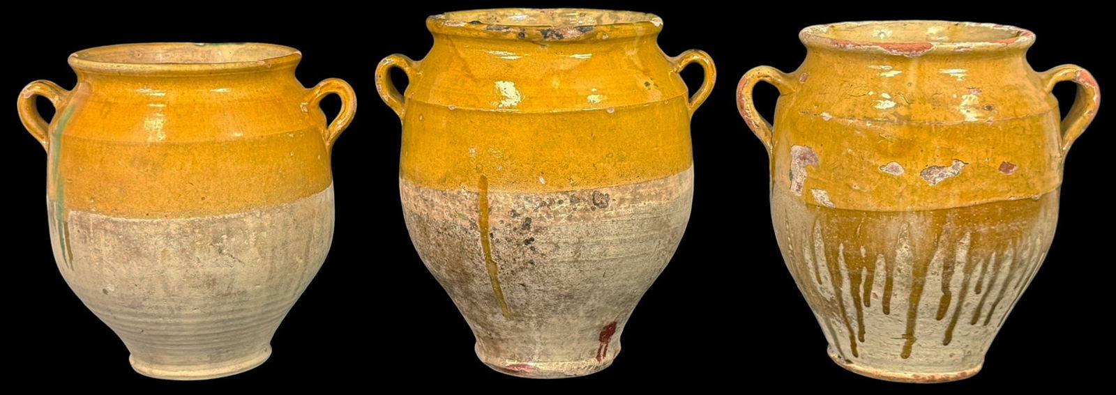 French Provencal Terracotta Confit Pots 3pc SET: Lot of three antique French glazed terracotta confit pots. Each pot features applied side handles, hand-thrown bodies, and natural clay undersides. These traditional vessels were used for preserving d