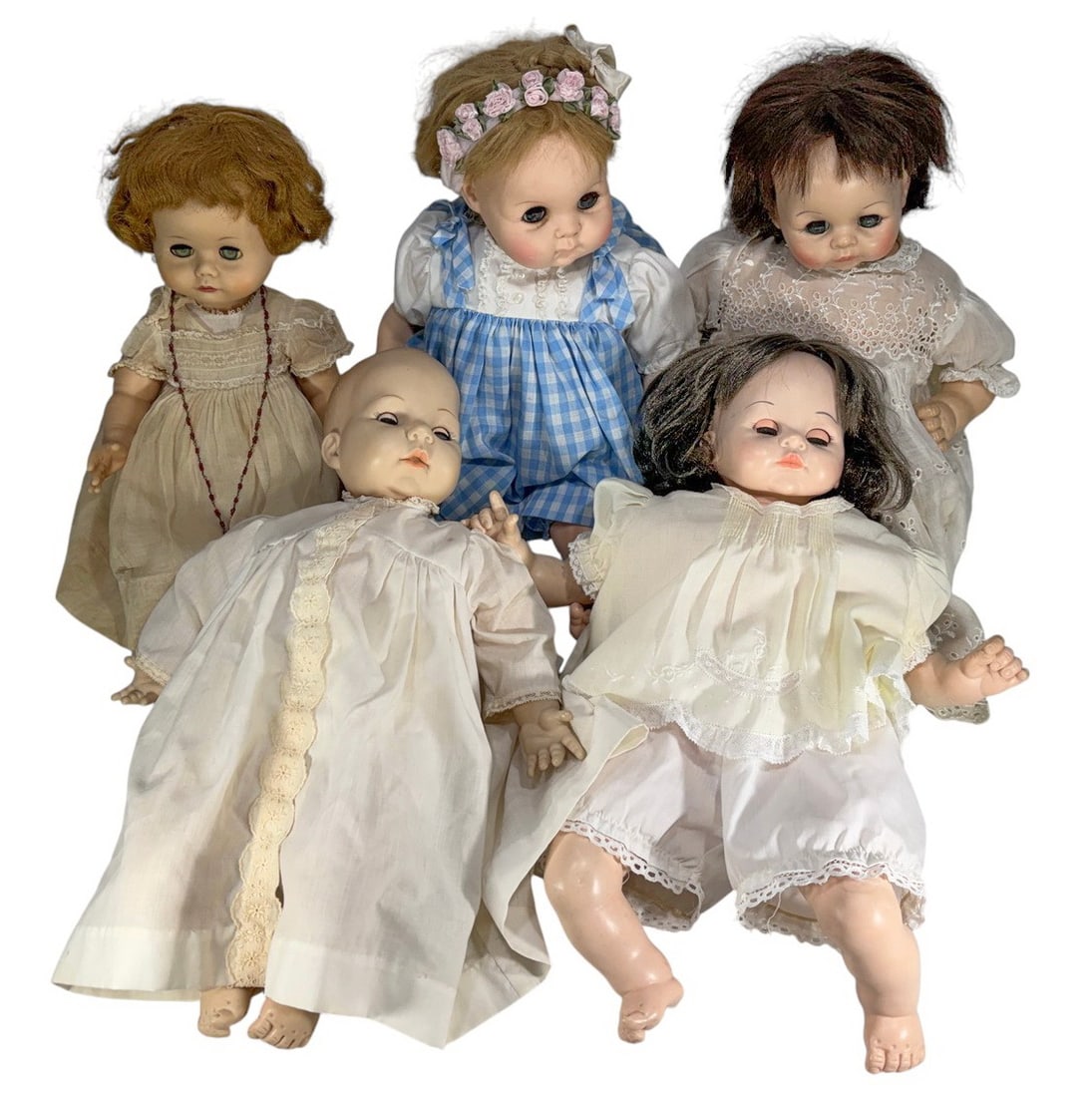 Madame Alexander Bisque & Rubber Dolls 5pc LOT: Madame Alexander lot of five vintage bisque and rubber dolls, including marked examples, dressed in period-style clothing with sleep eyes and jointed limbs. The largest measures approximately 19