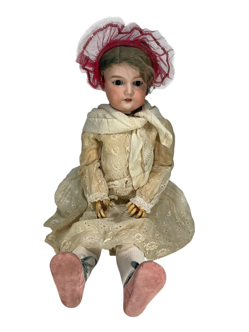 Armand Marseille German Bisque Glass-Eyed Doll: Armand Marseille, German antique bisque head doll marked 'A 14 M,' with glass sleep eyes, composition body, and vintage lace dress.Dimensions: 31.5 X 10 X 6 in. Condition: Good to fair overall