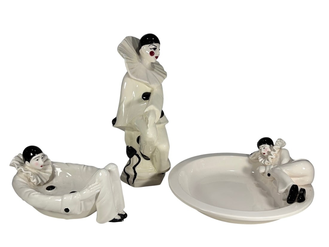 Taste Setter by Sigma Pierrot Ceramic Set 3pc LOT: Taste Setter by Sigma, Japan Art Deco-style ceramic Pierrot figural set including a standing clown figure and two figural dishes/ashtrays in white glaze with black and red accents. The tallest