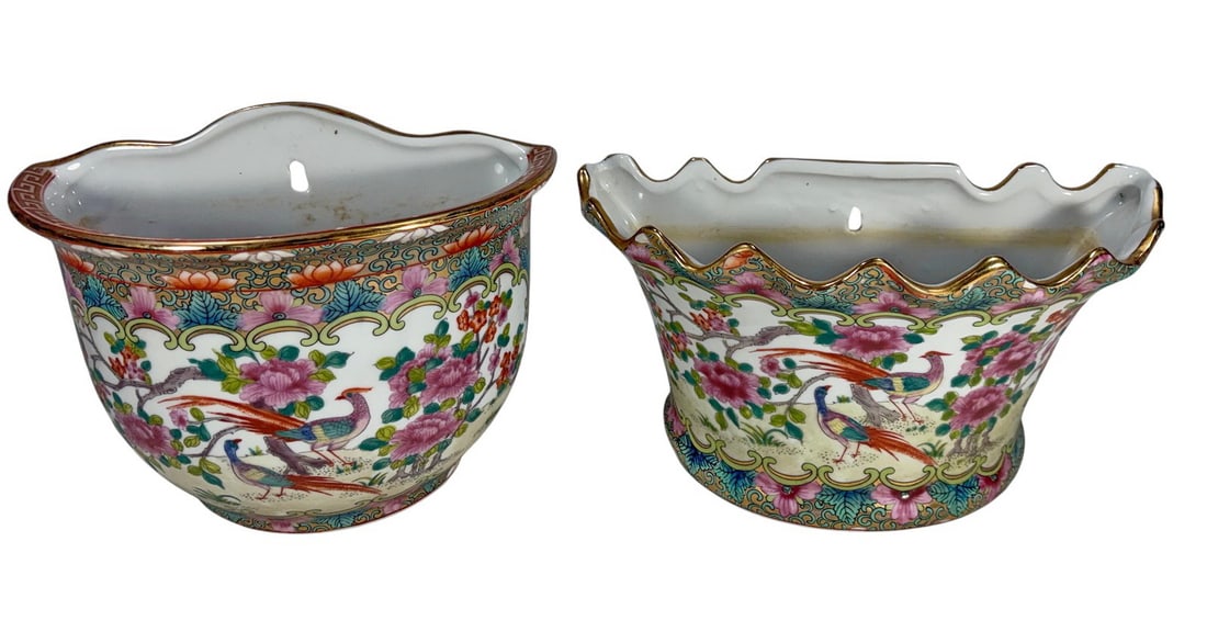 Chinese Rose Medallion Wall Pocket Vases 2pc LOT: Chinese pair of Rose Medallion style wall pocket vases with mirror image phoenix and peony enamels on gold ground. Wall hanging holes. Red seal marks on their bases. The largest measures