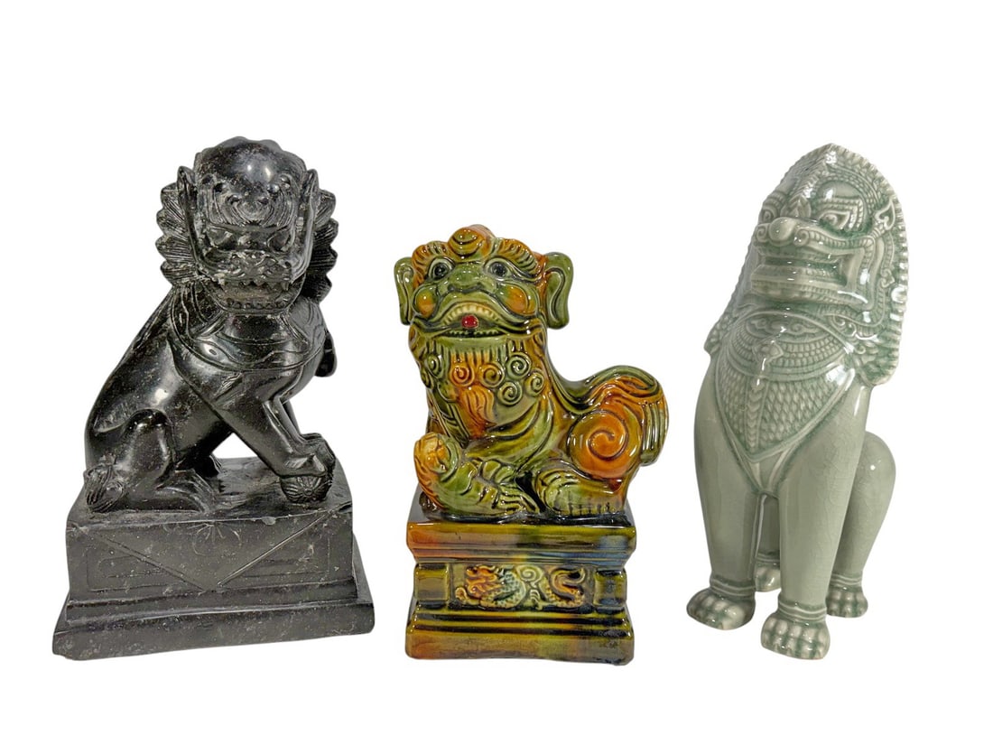 Chinese Carved Stone & Ceramic Foo Dogs 3pc LOT: Three-piece lot of Chinese foo dog figures, including a carved black stone guardian lion and two glazed ceramic examples, one with green crackle glaze and one polychrome. The largest measures approxim