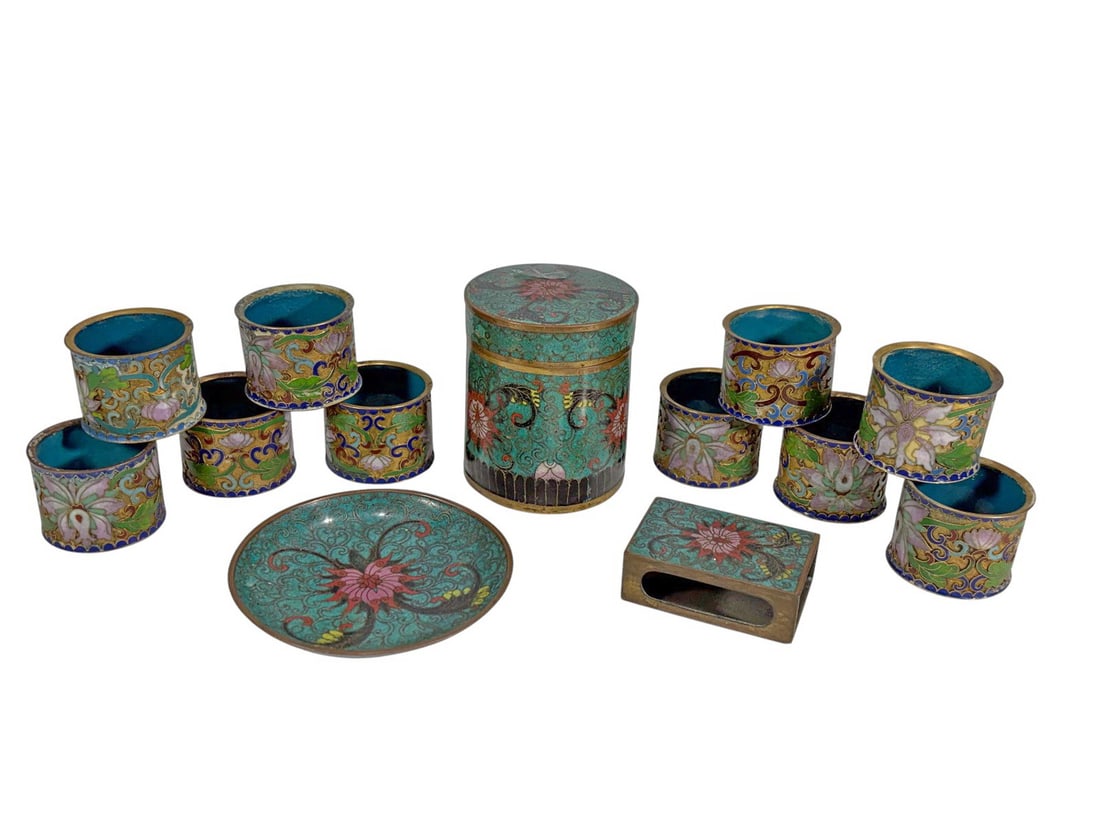 Cloisonne Napkin Rings & Desk Accessories 13pc LOT: Group of thirteen vintage cloisonne enamel desk and table accessories, including napkin rings, a lidded jar, a dish, and a rectangular desk piece with colorful floral decoration. The largest measures