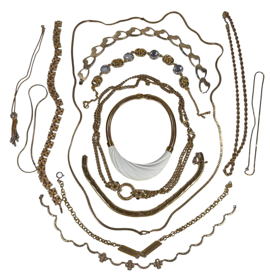 Assorted Necklaces Costume Jewelry 13pc LOT: Stylish 13-piece costume jewelry necklace lot in gold-tone metal, including assorted chain and statement styles with pendants, textured links, and occasional rhinestone or enamel accents. The longest