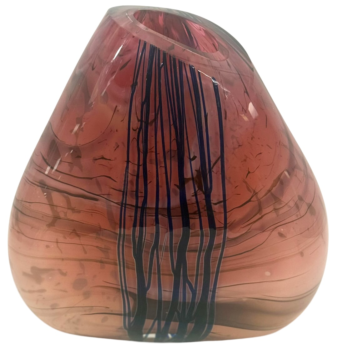 Artist Signed Abstract Studio Art Glass Vase 12" H: Late 20th century, hand-blown studio art glass vase featuring a bold and contemporary sculptural form. The piece has a triangular organic shape, with rich pink hues and deep cobalt blue trailing lines