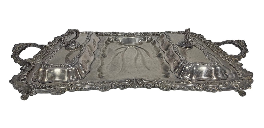 Vintage Silverplate Buffet Service 3 Parts Tray: Silver plated three compartment buffet service tray with two covered sections and central well. Ornate scroll, floral, and acanthus relief with decorative handles.Dimensions: 5.25 X 28.5 X 15 in. Cond