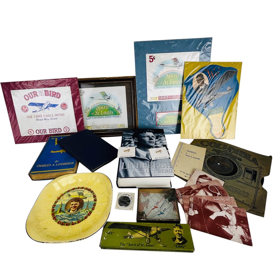 Charles Lindbergh Spirit of St Louis Memorabilia: Charles Lindbergh curated collection of vintage and commemorative memorabilia celebrating the famed aviator and his historic 1927 solo transatlantic flight in the Spirit of St. Louis. Includes several