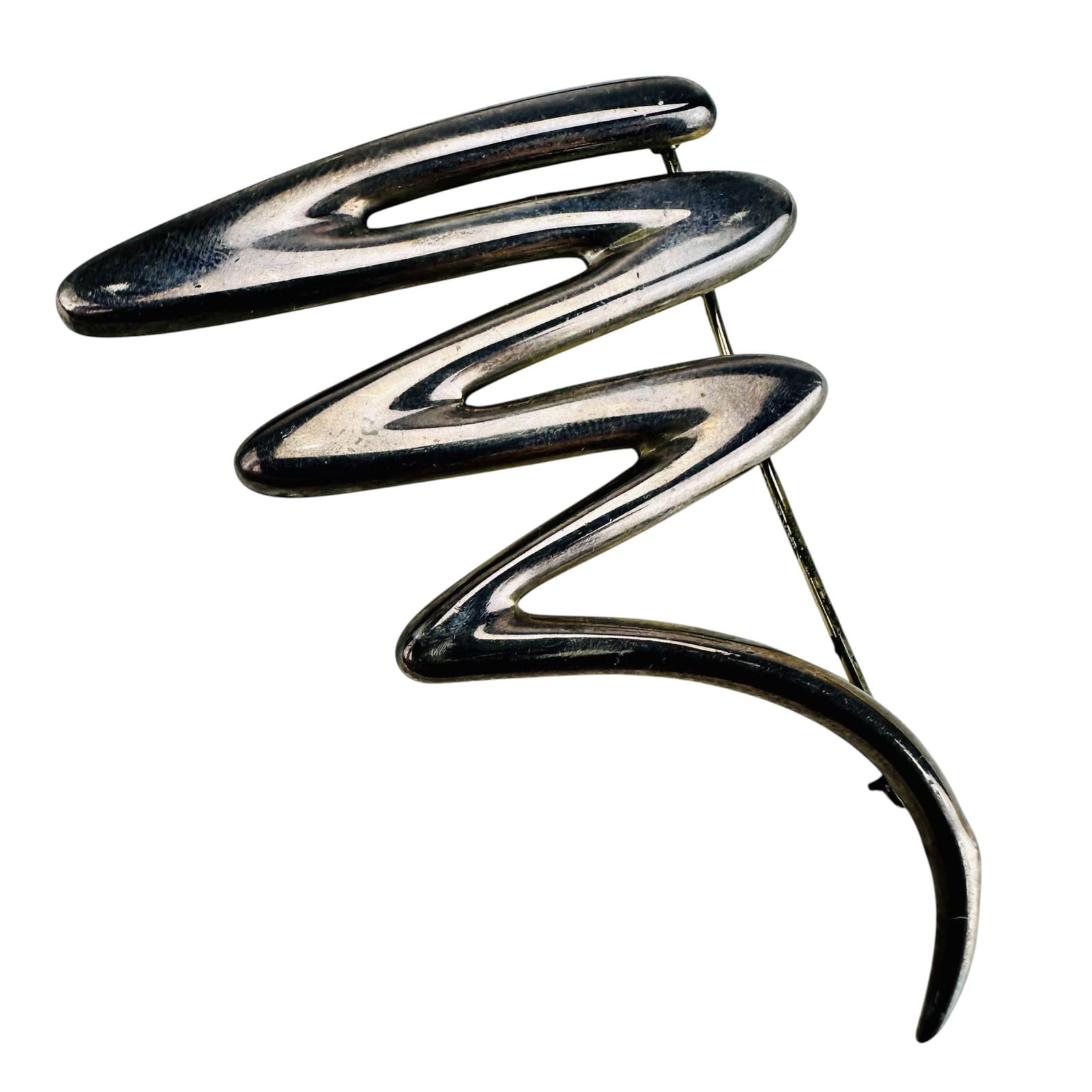 Paloma Picasso for Tiffany Sterling Scribble Pin: Paloma Picasso (French, born 1949), celebrated jewelry designer and business woman. Features an abstract line form design. Measures approximately 2" x 2.5" x .25". Stamped 1985 Tiffany & Co Sterling P