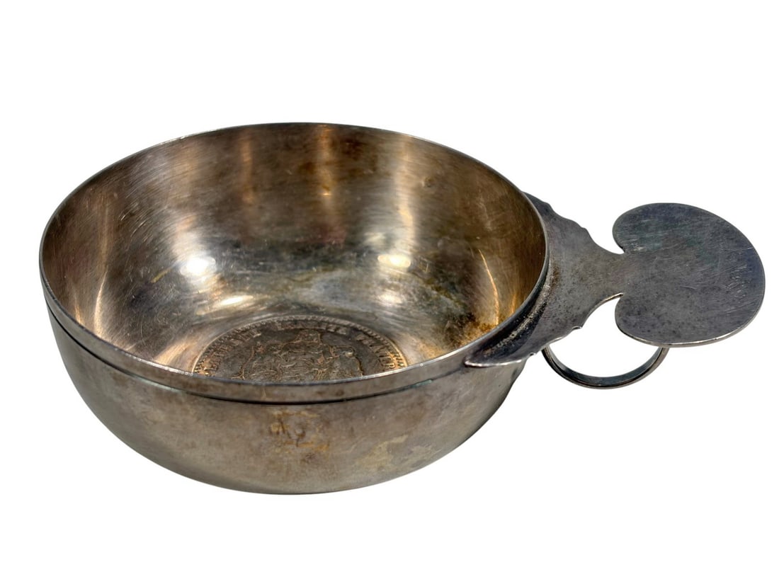 Hermes Silver Wine Taster by Ravinet & Denfert: Hermes Paris silver wine taster by silversmiths Louis Ravinet and Charles Denfert, France, featuring a shallow bowl with thumb tab and ring handle. Marked 'Hermes Paris and Ravinet & Denfert' mark,