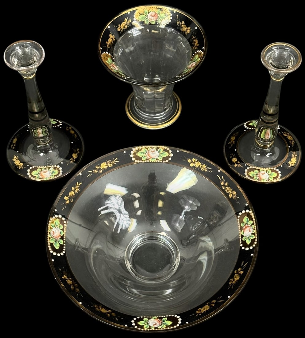 Vintage 20th C. Enameled Glass Table 4pc SET: Set of four finely enameled clear glass table items, each accented with a rich black band featuring hand-painted floral medallions, gold gilded scrollwork, and dotted detailing. Each candlestick holde