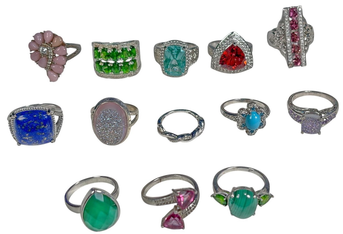 925 Silver, Lapis, Turquoise & Others Rings 13pcs: Assorted .925 sterling silver rings with mixed gemstone and druzy-style settings in a range of colors, including statement cabochons, halo designs, and multi-stone mounts. Measures approximately 1 x 0