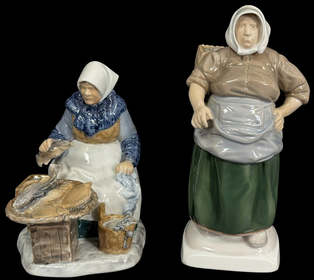 2pc Bing & Grondahl Copenhagen Porcelain Figurines: Lot of two vintage Bing & Grondahl Copenhagen porcelain figurines. One depicts a standing woman with a basket over her shoulder signed by the artist Hans Nielsen. The second figure depicts a fishmonge